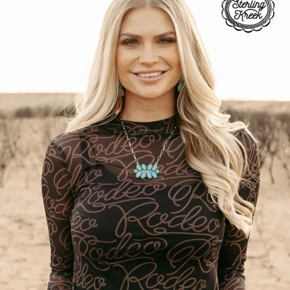Sterling Kreek Sheer Rodeo Print Top - Picture 1 of 2